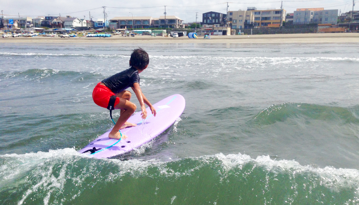Surfing with family in early morning.