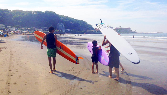 Surfing with family in early morning.